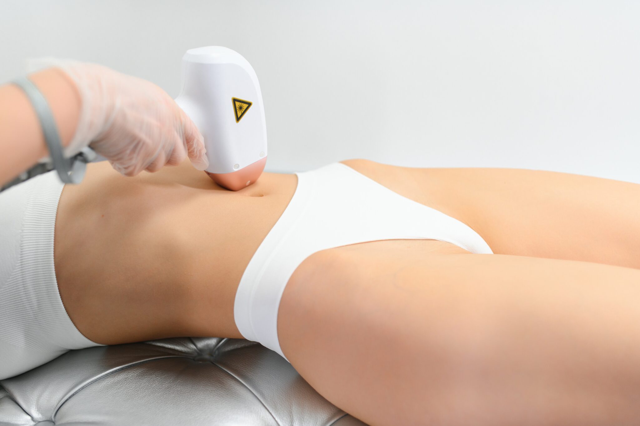 Laser hair removal of the bikini area. Epilation, depilation, body care, removal of unwanted hair, cosmetology.